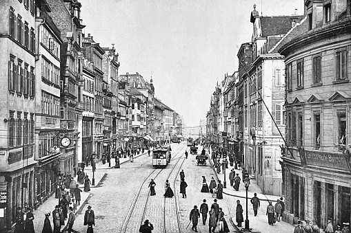 Königstrasse is Stuttgart's main shopping street. It is 1.2 kilometers long and is one of the busiest shopping streets in Germany. Photography from 19th century.