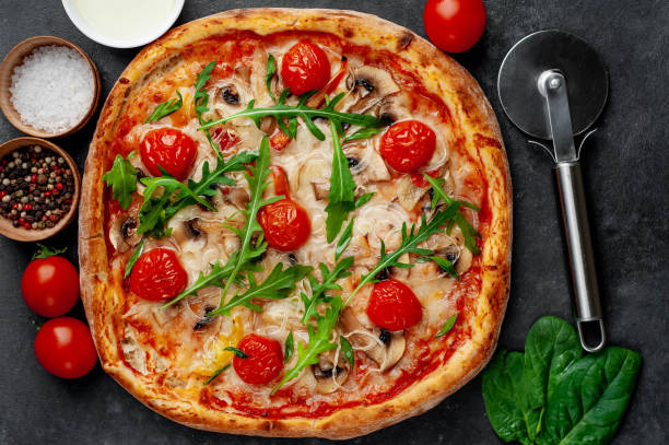 istock delicious homemade pizza on a stone background 1312299875