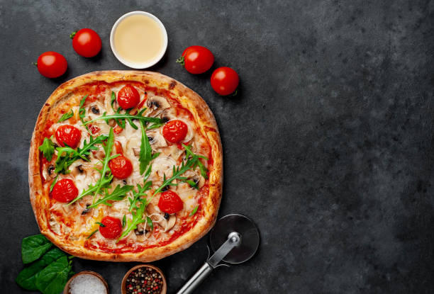 istock delicious homemade pizza on a stone background 1312299900