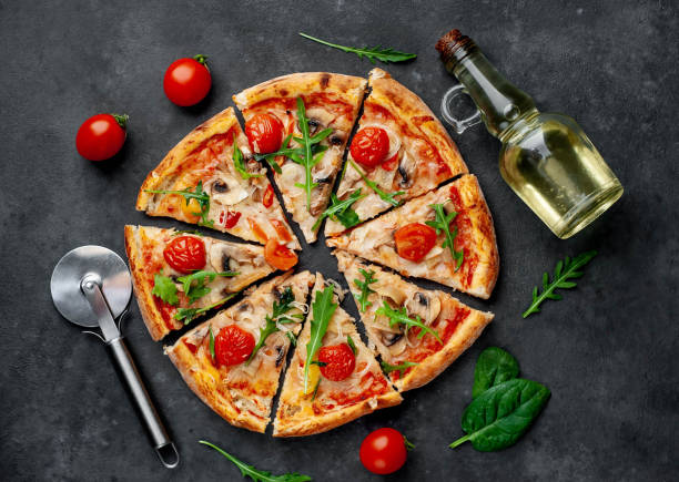 istock delicious homemade pizza on a stone background 1312299910