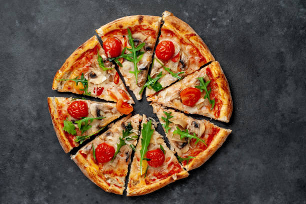 istock delicious homemade pizza on a stone background 1312299927