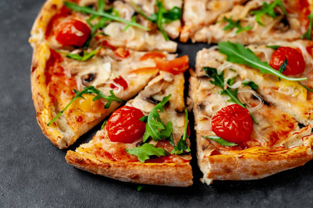 istock delicious homemade pizza on a stone background 1312299955