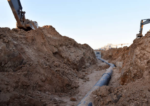 istock Laying sewer pipes. Sewage drainage system for a multi-story building 1312300005