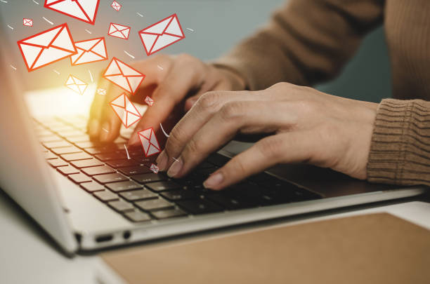 istock woman hand working business on laptop computer send email on desk at home office with virtual digital icon, social network, mail, digital marketing, work from home, connection technology concept 1312300936