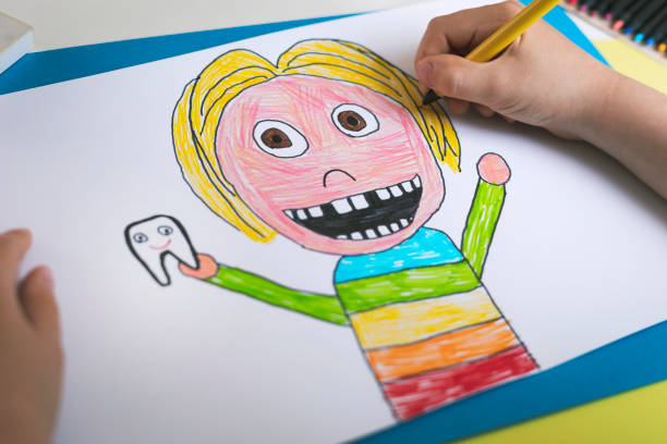 istock Little child drawing at home. Self portrait. 1312302284