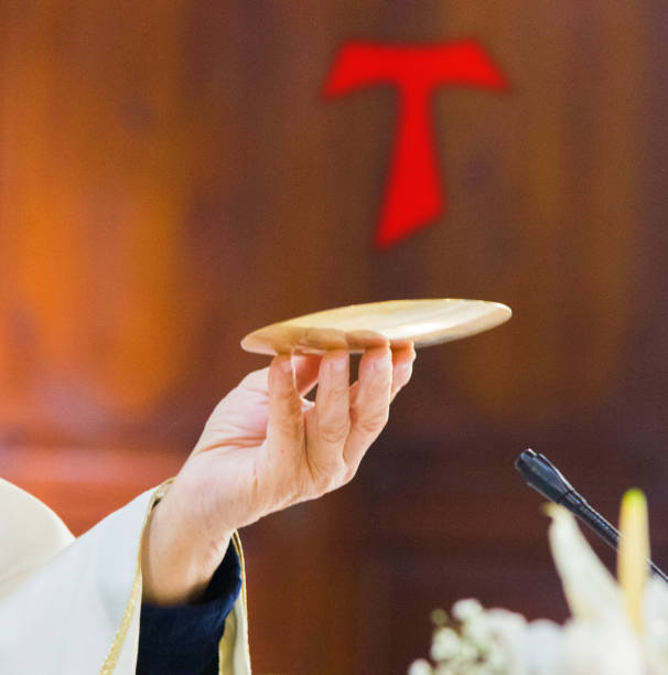 istock hands of the pope celebrated the Eucharist 1312302752