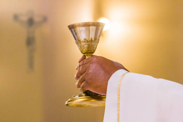 istock hands of the pope celebrated the Eucharist 1312302762