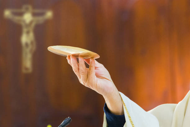 istock hands of the pope celebrated the Eucharist 1312302786