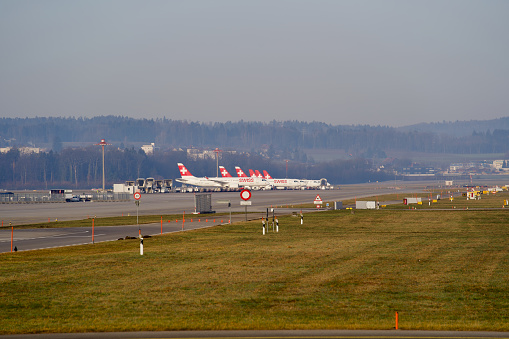 Runway of Zurich Airport (German: Flughafen Zürich, IATA: ZRH, ICAO: LSZH).Photo taken February 23nd, 2021, Kloten, Switzerland.
