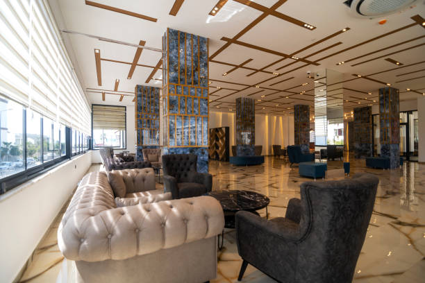 istock Lobby entrance with reception desk and lounge area 1312305752