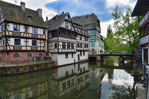 The River III and traditional half timbered houses of historic Petite France district, Strasbourg, Alsace, France