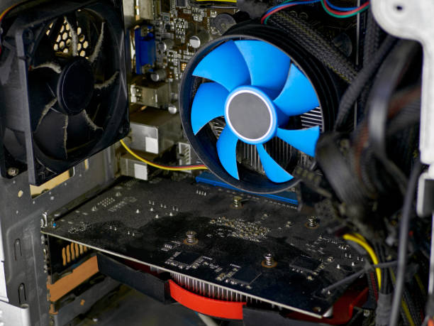 istock Desktop computer covered in dust. CPU cooler and fan in the dust. Concept of a computer service. Cleaning the computer's system unit 1312307522