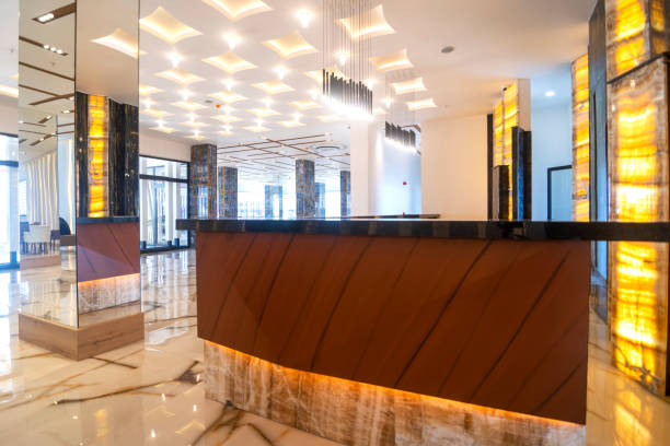 istock Lobby entrance with reception desk and lounge area 1312307716