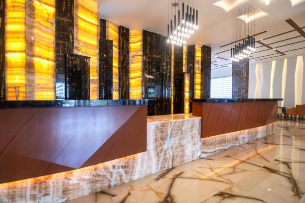 istock Lobby entrance with reception desk and lounge area 1312309003