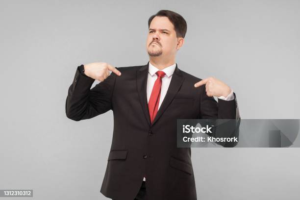 A Very Proud Man Shows His Fingers And Boasts Stock Photo - Download Image Now - Arrogance, Selfishness, One Person