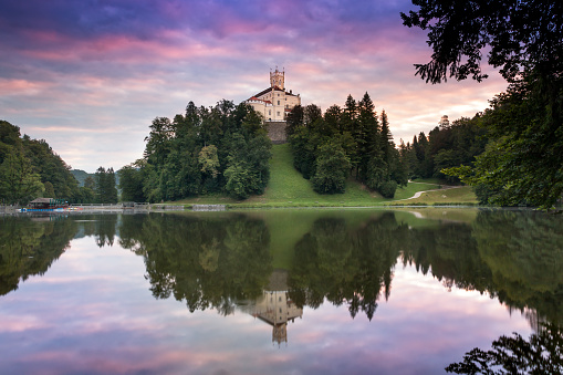 Croatia, Trakoscan castle in summer morning with lake reflections