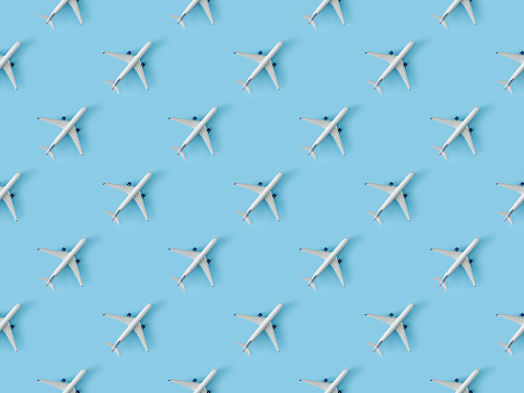 Seamless repetitive Airplane on blue background