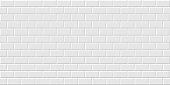 istock White metro tiles seamless background. Subway brick horizontal pattern for kitchen, bathroom or outdoor architecture vector illustration. Glossy building interior design tiled material 1312314989