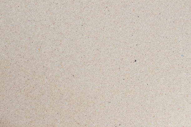 istock Paper texture, cardboard background, copy space. Recyclable material, small inclusions of cellulose 1312315339