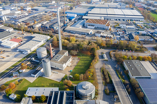 Industrial district viewed from above, waste incinerator plant is seen in the foreground.