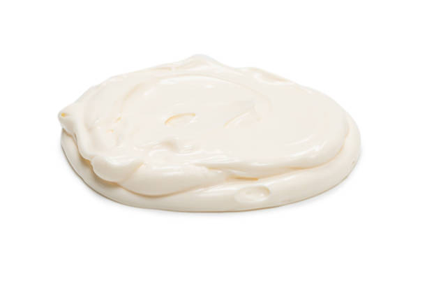 istock White sauce splashes isolated on white background. 1312323457
