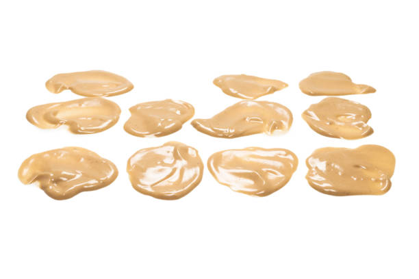 istock Mushroom sauce splashes isolated on white background. 1312323527