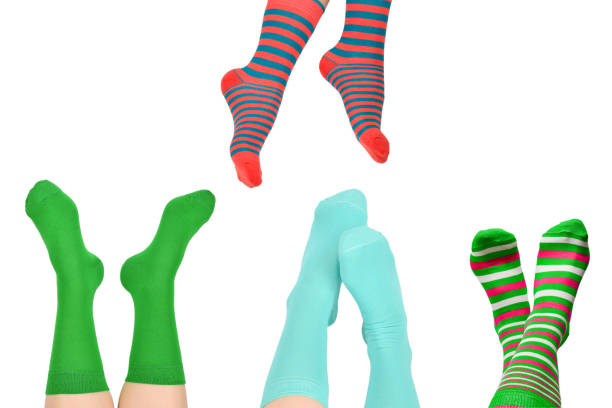 istock Woman in green socks isolated on white background. Top view. 1312323549