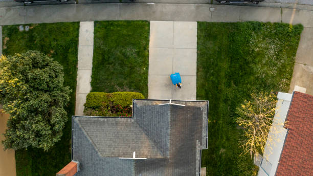 istock Boy taking out the Trash at home 1312325174