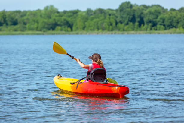 istock Girl Kayaking on Lake in Summer 1312325230