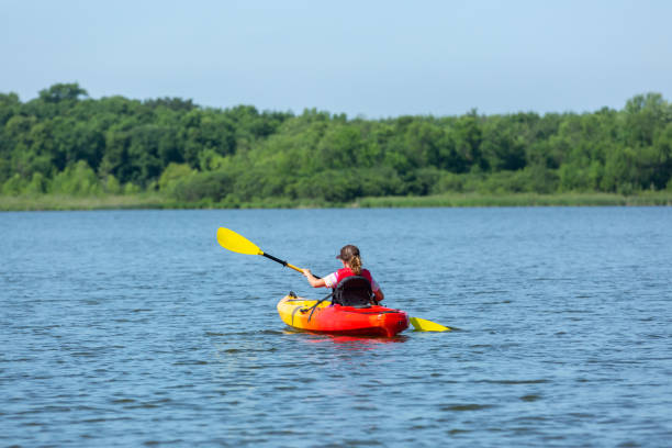 istock Girl Kayaking on Lake in Summer 1312325306