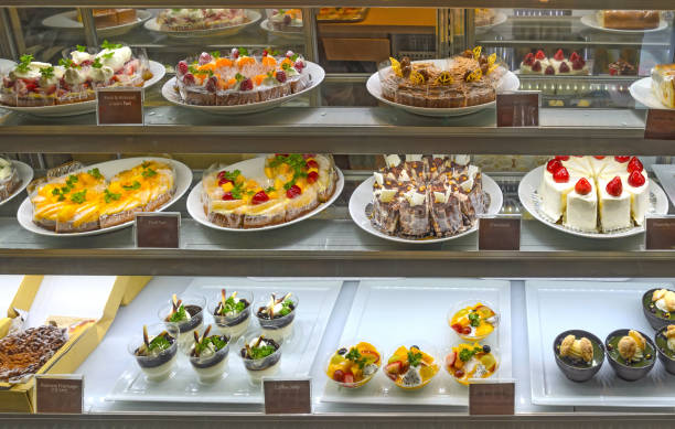 istock various cakes and sweets in the display case of a bakery 1312325320