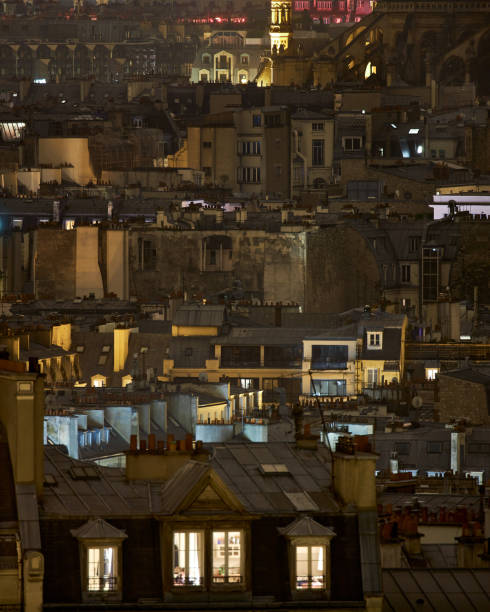 Backyard Paris behind Les Halles. Night view of old Paris buildings behind the Saint Eustache church. église saint eustache stock pictures, royalty-free photos & images