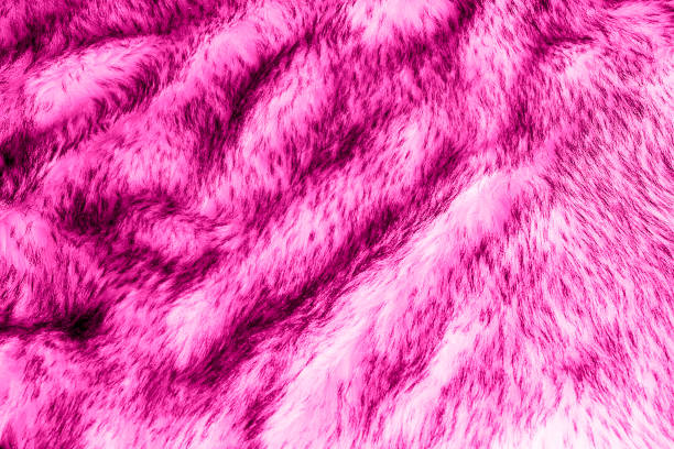 istock Pink artificial fur background texture for design, rose fake animal fell 1312329047