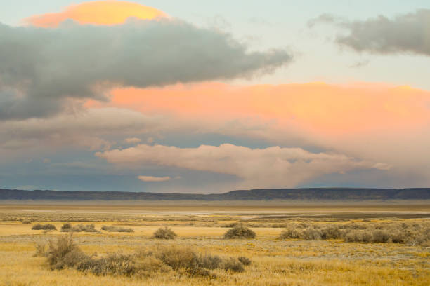 istock Clouds Over The Alvord Desert At Sunset 1312329367