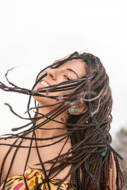 istock girl in motion brown hair dreadlocks 1312330376