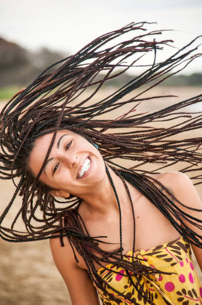 istock girl in motion brown hair dreadlocks 1312330402