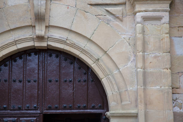 istock Door of Saint Christopher Church, Comillas, Cantabria 1312332035