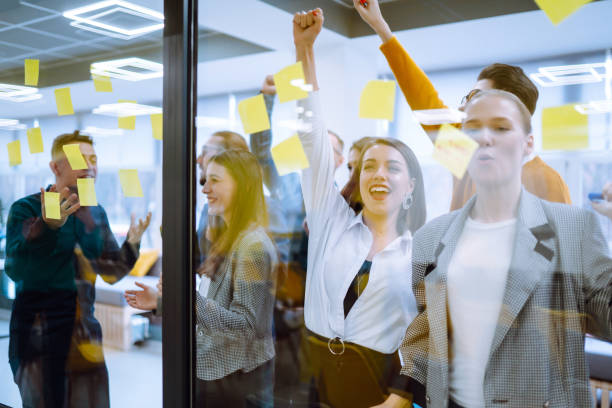 istock Group of young modern people working on project together. 1312332673