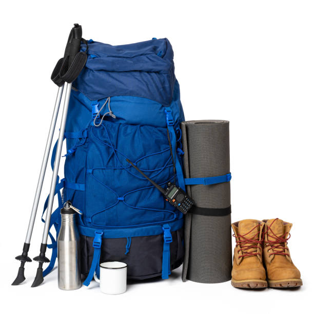 istock Blue hiking backpack with fitness mat isolated on white 1312334449