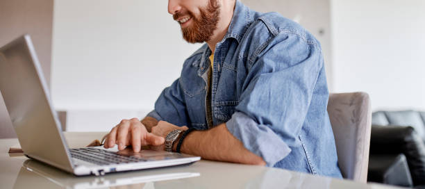 istock Portrait of a happy freelancer at home office 1312337312