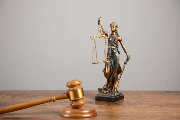 istock judge gavel with justice lady 1312338433