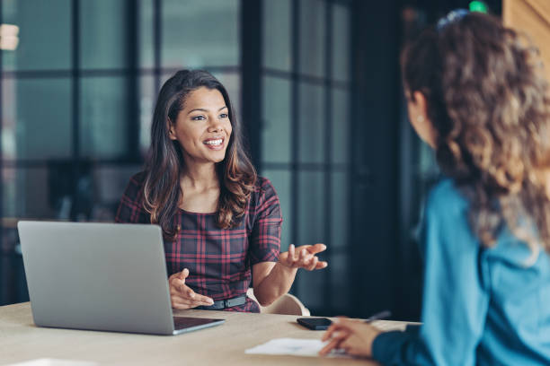 istock Businesswomen having a conversation 1312339225