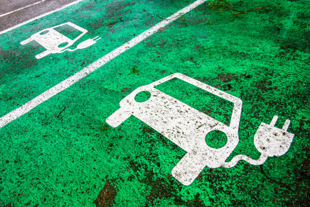 istock road marking at a electric car charging station 1312339260