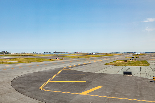 runway with aircraft for big jets at an international airport, USA