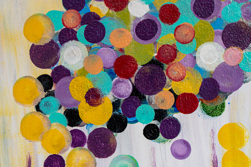 background with textured fabric circles painted in different colors. Concept of variety, diversity and art