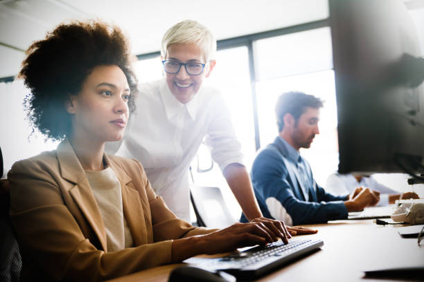 istock Group of multiethnic business people working at busy modern office 1312344903