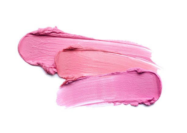 istock Smudged lilac pink textured lipstick on white isolated background 1312345596