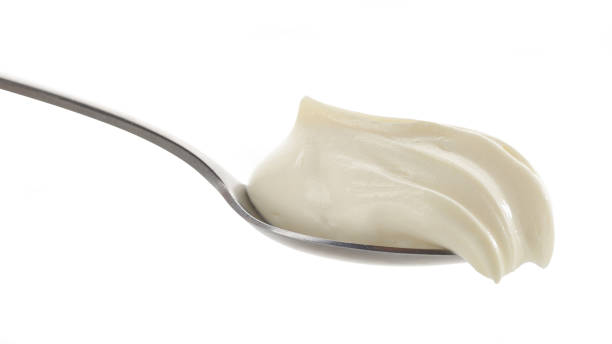 istock spoon of cream cheese 1312347908