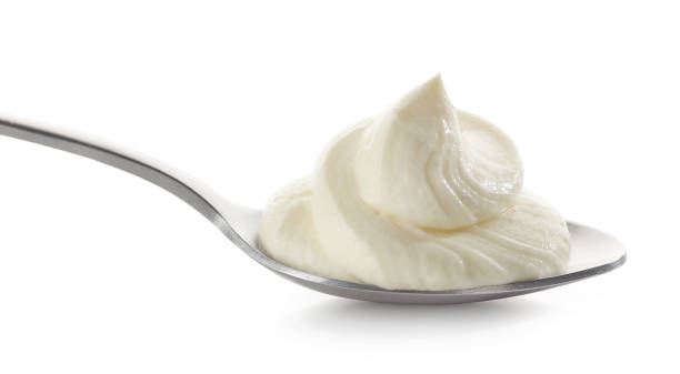 istock spoon of cream cheese 1312347930