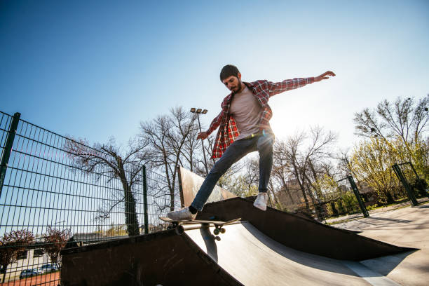 istock Skateboarding in skate park 1312349558